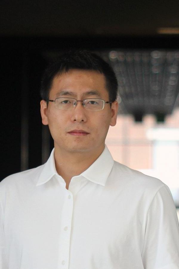 UNH researcher Dialiang Chen, a male, looks at the camera wearing a white shirt.